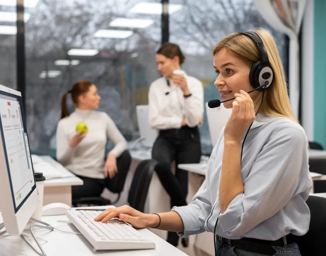 woman-working-call-center-talking-with-clients-using-headphones-microphone